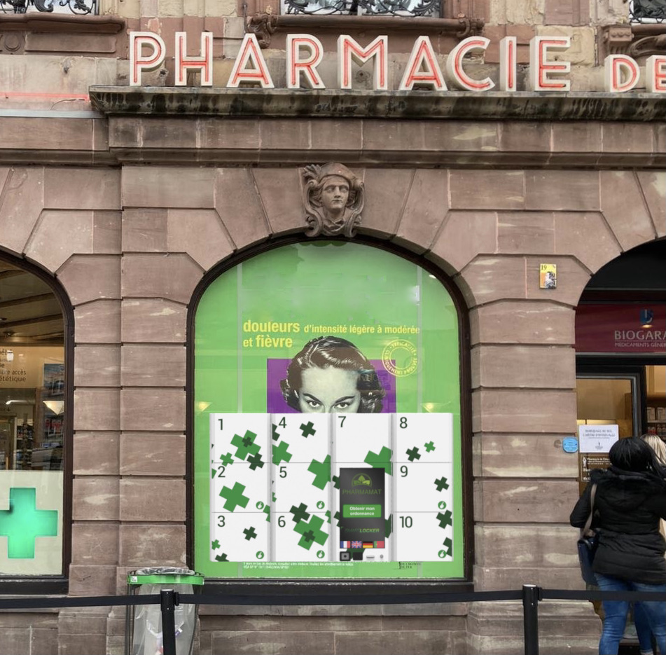 Maintenance automate installé dans la vitrine d'une pharmacie